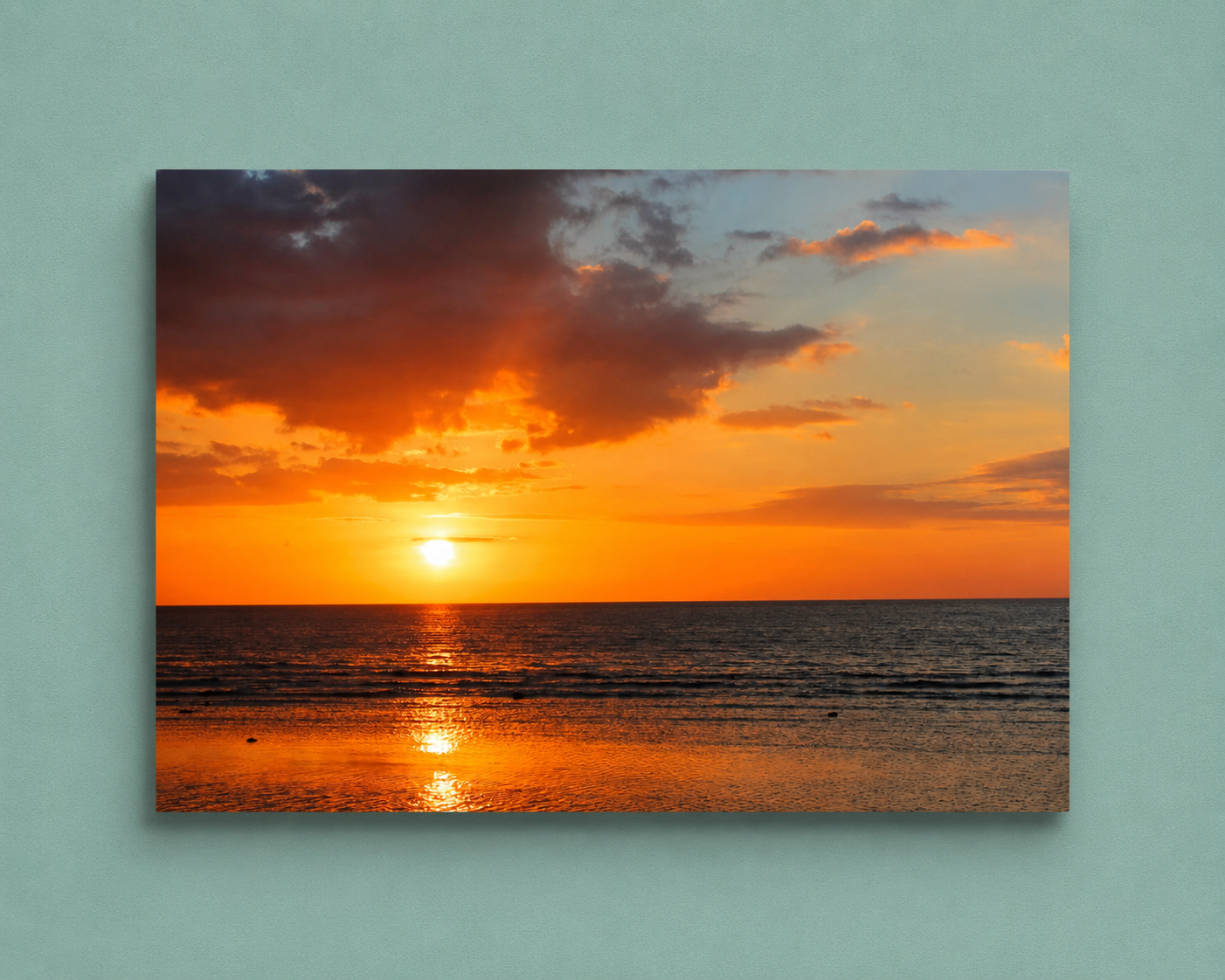 Sunset over water with orange and purple hues on a light blue background