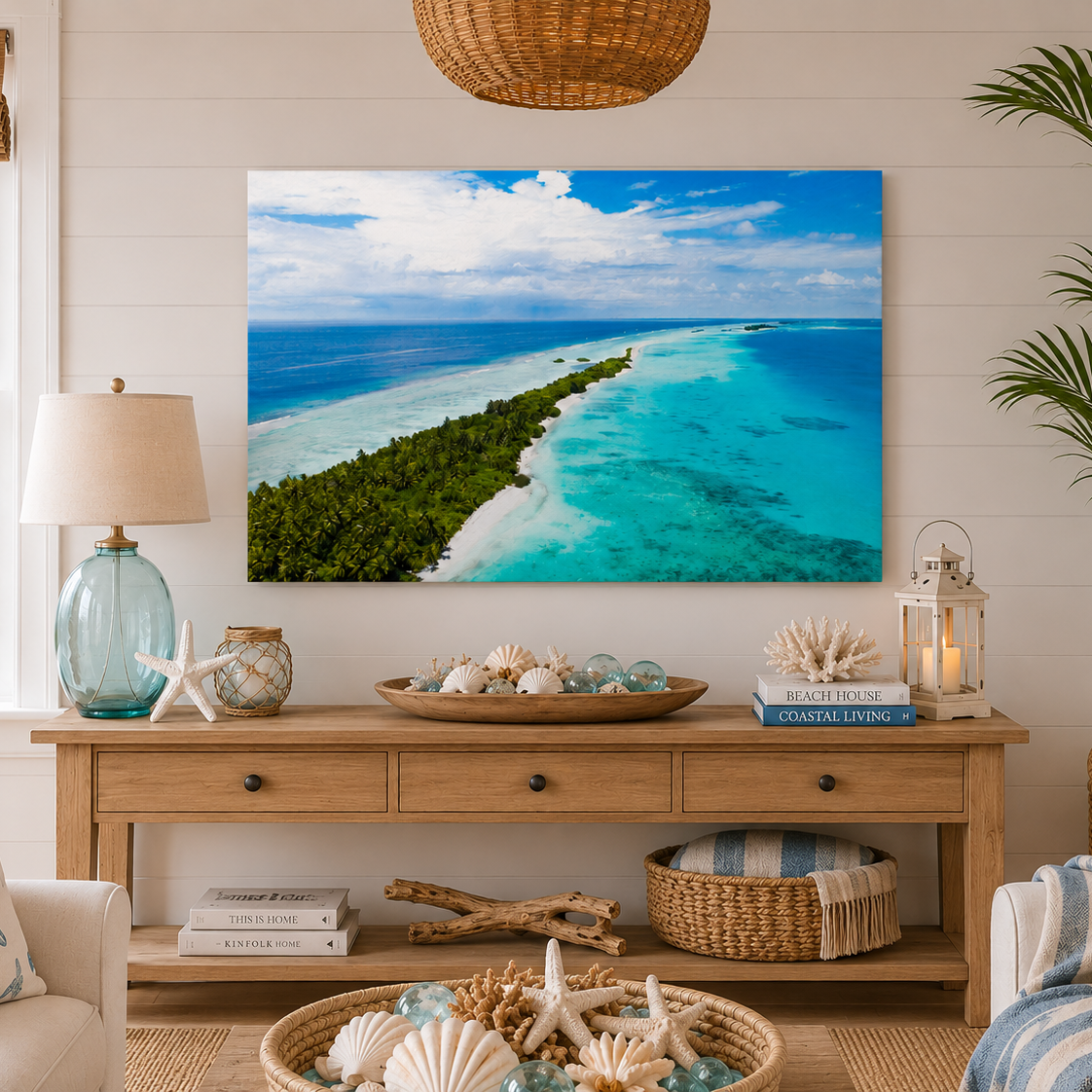 Living room with a large wall art of a tropical beach scene, wooden console table, and decorative items.